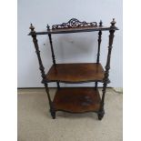 A BURR WALNUT VICTORIAN THREE TIER DISPLAY UNIT.