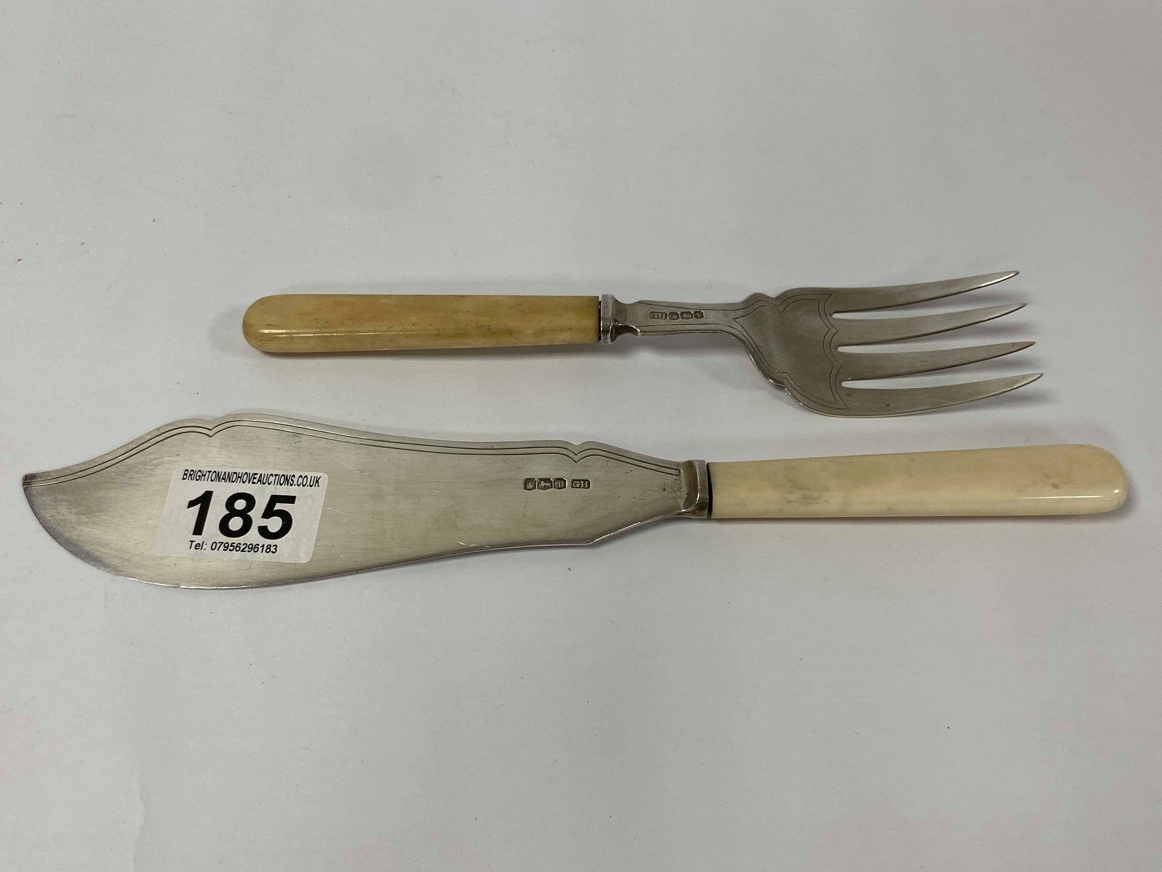 A PAIR OF SILVER FISH SERVERS, HALLMARKED SHEFFIELD 1926 BY HARRISON BROTHERS, 27CM LONG