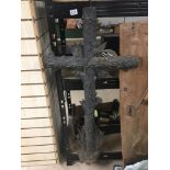 A HEAVY CAST METAL CRUCIFIX 128X57CMS.