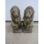 A PAIR OF CONCRETE FIGURES OF LIONS, 41CM HIGH