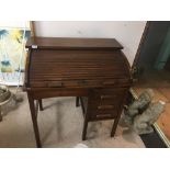 AN EARLY 20TH CENTURY STAINED OAK ROLL TOP DESK, 94CM HIGH BY 88CM WIDE