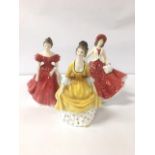 THREE ROYAL DOULTON FIGURES OF LADIES; CHRISTMAS DAY 1999 HN 4214, CORALIE HN 2307 AND WINSOME HN