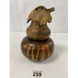 PRIVATE COLLECTION: AN UNUSUAL AFRICAN VINTAGE CARVED WOODEN DOUBLE GOURD MONEY BOX WITH CARVED LEAF