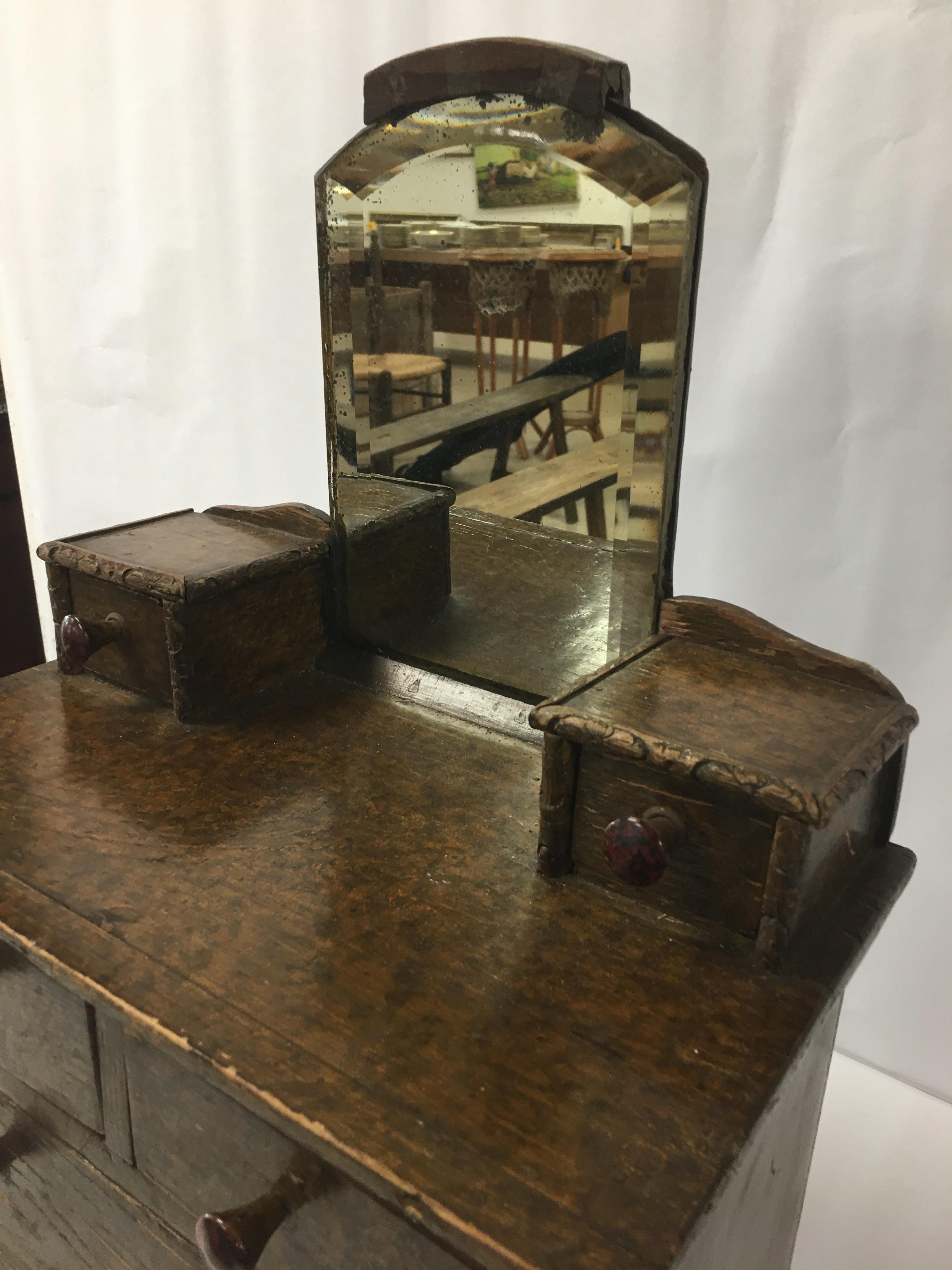 A WOODEN APPRENTICE PIECE DRESSING TABLE WITH SIX DRAWERS UNDER A BEVELED MIRROR, 53CM HIGH - Image 2 of 3