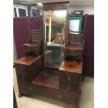 A LARGE ARTS AND CRAFTS MAHOGANY DRESSING TABLE BY SHAPLAND AND PETTER WITH HAMMERED PEWTER HEART