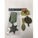 AN AIR CREW EUROPE STAR MEDAL WITH RIBBON, TOGETHER WITH A ROYAL ENGINEERS CAP BADGE AND MORE