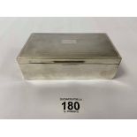 A SILVER CIGARETTE BOX OF RECTANGULAR FORM WITH ENGINE TURNED DECORATION THROUGHOUT, HALLMARKED