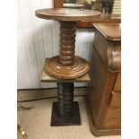 TWO FRENCH WOODEN SIDE TABLES OF CIRCULAR FORM WITH CORKSCREW STYLE PEDESTALS, LARGEST 65CM HIGH