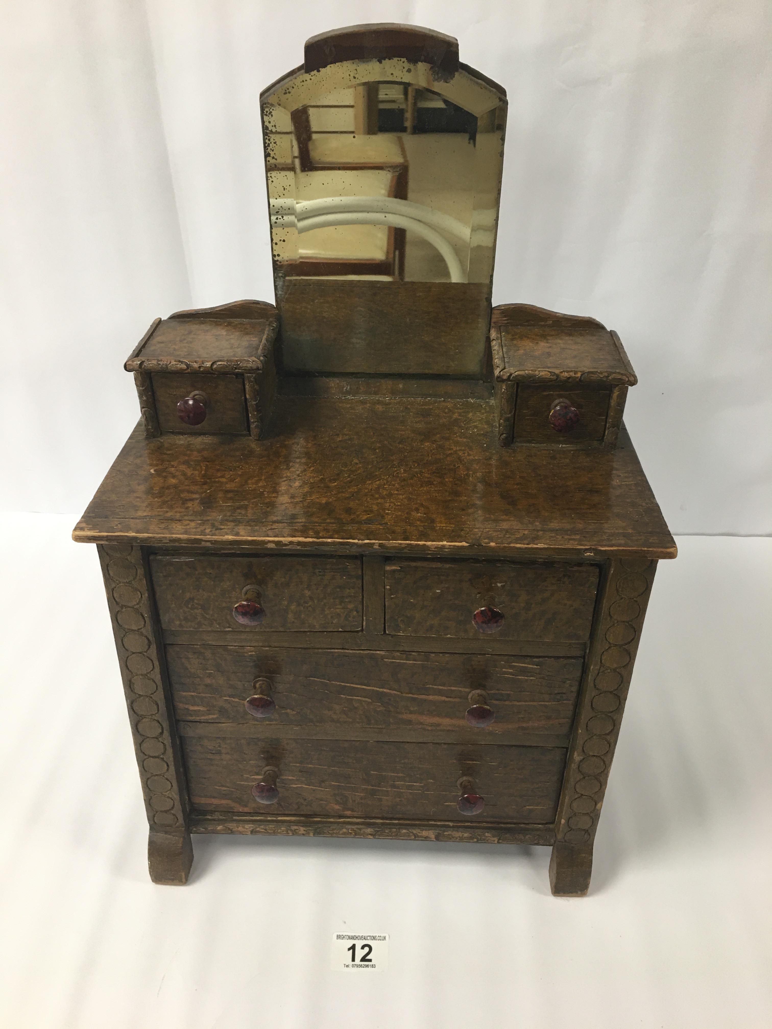 A WOODEN APPRENTICE PIECE DRESSING TABLE WITH SIX DRAWERS UNDER A BEVELED MIRROR, 53CM HIGH