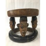 PRIVATE COLLECTION OF A BRIGHTON RESIDENT: A VINTAGE NIGERIAN WOODEN YORUBA STOOL OF CIRCULAR