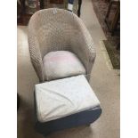 A VINTAGE WICKER CHAIR AND STOOL.