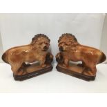 A LARGE PAIR OF LATE 19TH/EARLY 20TH CENTURY CERAMIC STAFFORDSHIRE STYLE FIGURES OF MEDICI LIONS,