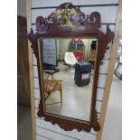 A GEORGIAN MAHOGANY FRAMED WALL MIRROR WITH PIERCED AND GILT DETAILING THROUGHOUT, 95CM HIGH