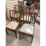 FOUR VINTAGE TEAK DINING CHAIRS.