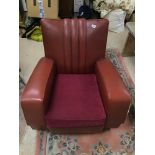 AN ART DECO ARMCHAIR IN RED.