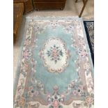 TWO ORIENTAL STYLE RUGS