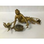 A GILT METAL FIGURE OF A SEATED LADY AND A SIMILAR GILT METAL LEAF MOTIF, BOTH IN THE ART NOUVEAU