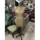 A VINTAGE MANNEQUIN ON METAL BASE MARKED LEVINE LONDON PARIS.