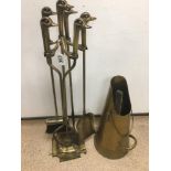 A BRASS COMPANION SET WITH GEESE HANDLES AND BRASS COAL SCUTTLE.