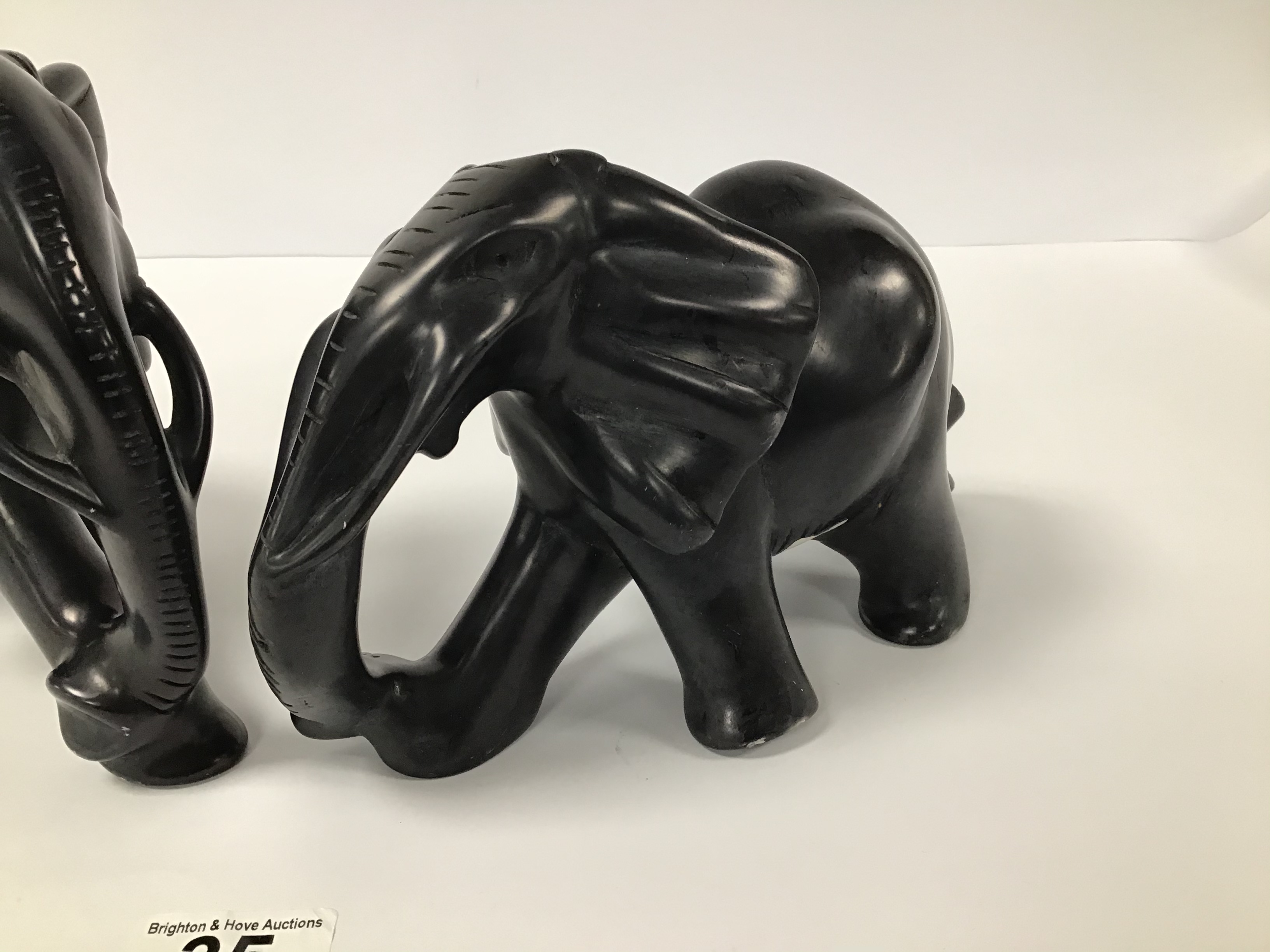 TWO CARVED HEAVY AFRICAN STONE FIGURES OF ELEPHANTS BY BESMO, LARGEST 23CM WIDE - Image 5 of 6