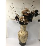 A LARGE ORIENTAL STYLE VASE OF BALLISTER FORM WITH FAKE FLOWERS 64CMS