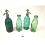 TWO VINTAGE GREEN GLASS SODA SYPHONS, 34CM HIGH, TOGETHER WITH TWO GLASS MILK BOTTLES