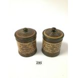 A PAIR OF DOULTON LAMBETH GLAZED STONEWARE LIDDED POTS OF CIRCULAR FORM, DECORATED THROUGHOUT WITH