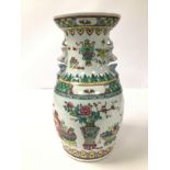 A 20TH CENTURY CHINESE PORCELAIN FAMILLE ROSE PATTERN VASE OF BALUSTER FORM WITH FLARED RIM, WITH