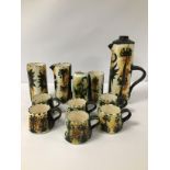 ELEVEN PIECES OF STUDIO POTTERY WITH PHOENIX DESIGNS, INCLUDING TEA POT, CUPS AND MORE