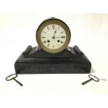 A LATE 19TH/EARLY 20TH CENTURY SLATE NAPOLEON MANTLE CLOCK, THE ENAMEL DIAL WITH ROMAN NUMERALS