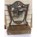 A VICTORIAN SHIELD GLASS SWING TOILET MIRROR WITH VICTORIAN IVORY ESCUTEONS AND HANDLES IN