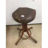 A FRENCH INDUSTRIAL WOODEN ADJUSTABLE STOOL