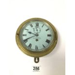 A BRASS CASED WALL CLOCK OF CIRCULAR FORM BY T.L AINSLEY OF SOUTH SHIELDS, THE ENAMEL DIAL WITH