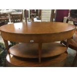 A MID CENTURY WOOD VENEER OVAL SHAPED COFFEE TABLE 120 X 60 X 56 CMS