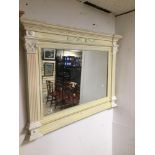 A PAINTED WOODEN OVERMANTLE MIRROR 110 X 78CMS.