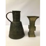 AN UNUSUAL EARLY BRONZE POURING VESSEL WITH ENGRAVED DECORATION DEPICTING TEN WHAT LOOK LIKE KINGS