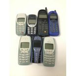 A GROUP OF SIX VINTAGE MOBILES, INCLUDING FOUR NOKIA BRICK PHONES, A MOTOROLA TALKABOUT AND MOTOROLA