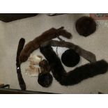 A COLLECTION OF FUR STOLES AND GLOVES WITH HAT.