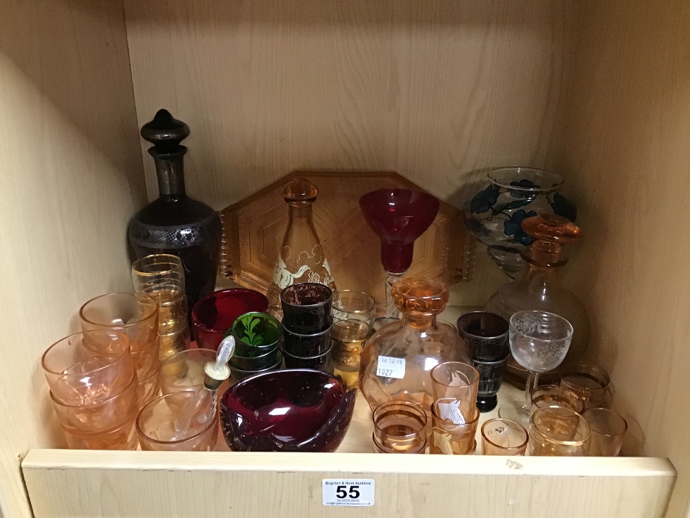 A LARGE COLLECTION OF ASSORTED DRINKING GLASSWARE, MOST COLOURED GLASS, INCLUDING DECANTERS, GLASSES