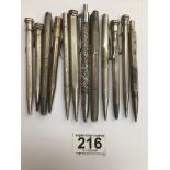 A COLLECTION OF TWELVE SILVER PROPELLING PENCILS OF VARYING SHAPES AND DESIGNS, COMBINED WEIGHT
