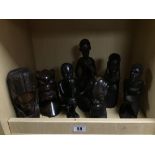 A GROUP OF SEVEN AFRICAN CARVED WOODEN FIGURES, LARGEST 26CM HIGH