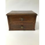 A LATE 19TH/EARLY 20TH CENTURY MAHOGANY TWO DRAWER SET OF DRAWERS, 27.5CM WIDE BY 17CM HIGH