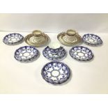 A COLLECTION OF ROYAL CROWN DERBY PORCELAIN, COMPRISING TEA CUPS AND SAUCERS FROM DIFFERENT ERAS,