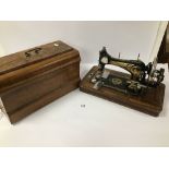 A 20TH CENTURY FRISTER AND ROSSMANN SEWING MACHINE IN ORIGINAL FITTED CARRY CASE