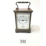 A LARGE BRASS CASED CARRIAGE CLOCK BY MATTHEW NORMAN OF LONDON, THE ENAMEL DIAL WITH ROMAN