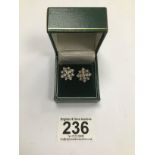 A PAIR OF 9CT GOLD AND DIAMOND SNOWFLAKE SHAPED EARRINGS, 2.76