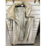 A LADIES FUR COAT POSSIBLY MINK