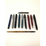 A COLLECTION OF VINTAGE PENS, INCLUDING WATERMAN, OSMIROID, A SILVER PLATE WITH ENAMEL THREE