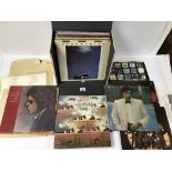 A GROUP OF VINTAGE VINYL/RECORDS/LP'S INCLUDING JOHN LENNON AND BOB DYLAN, IN TRAVEL CASE