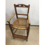 A CHILDS VICTORIAN CANE WORKED HIGH CHAIR